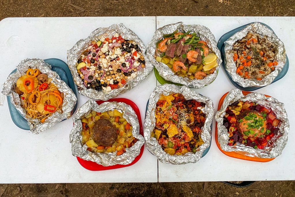 meals made on a table inside foil packets