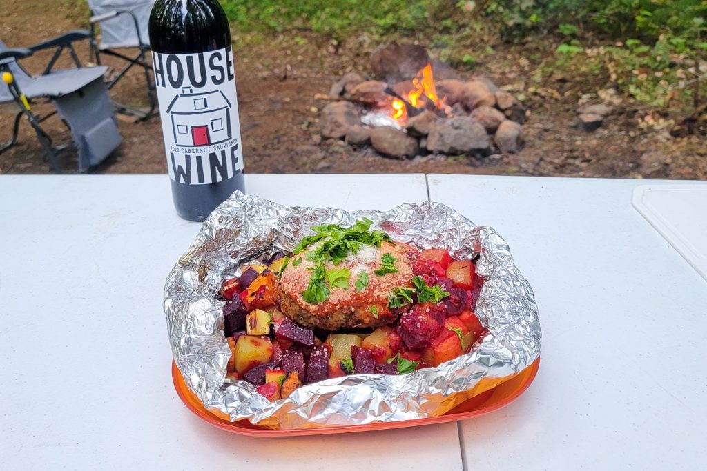 meal on a camp table with wine