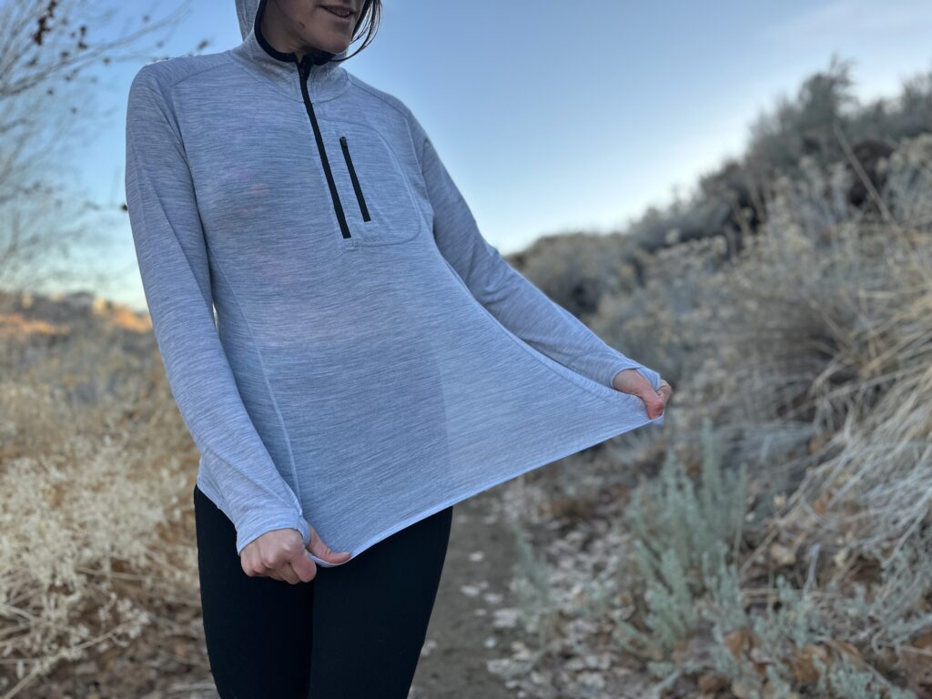 woman hiking around high desert plants 