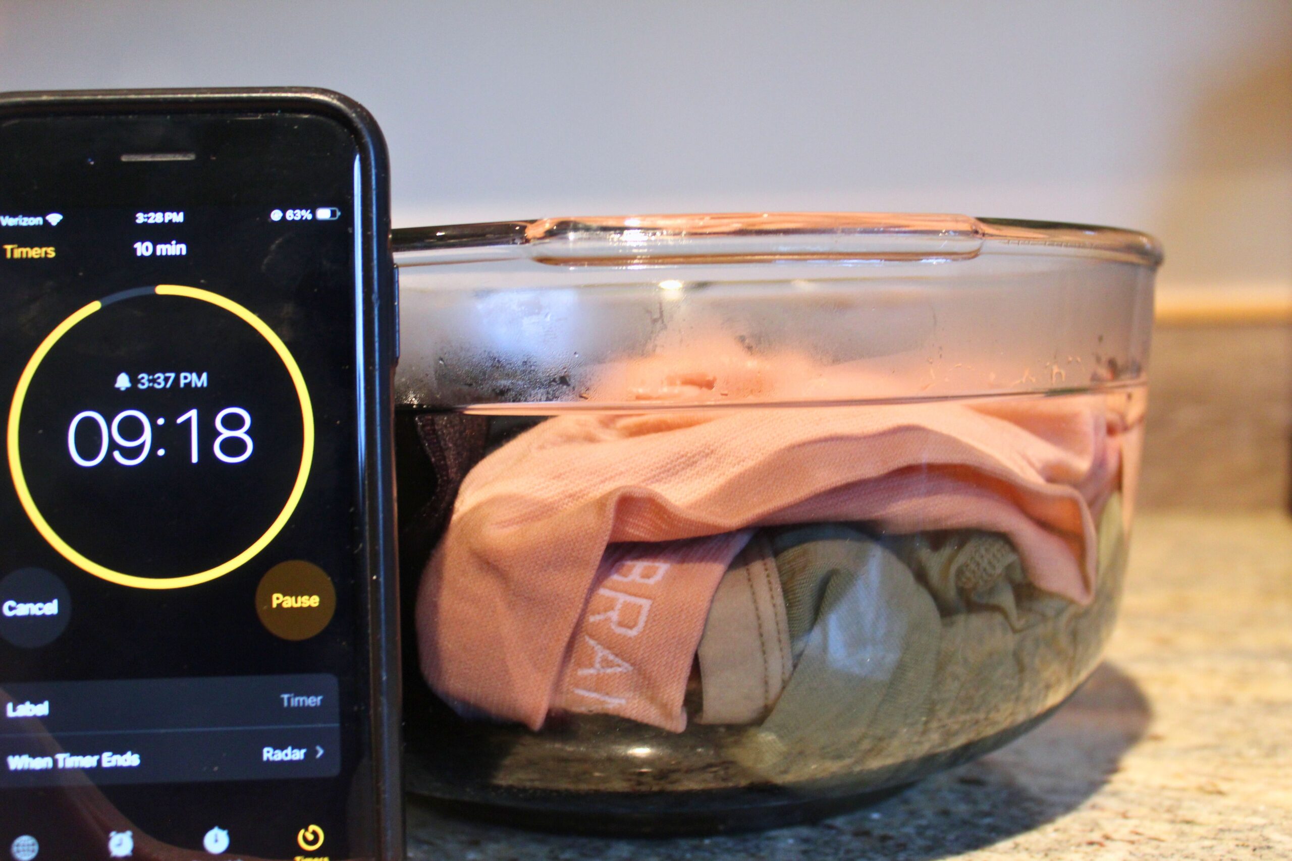 Soaking the underwear in a bowl before a drying test